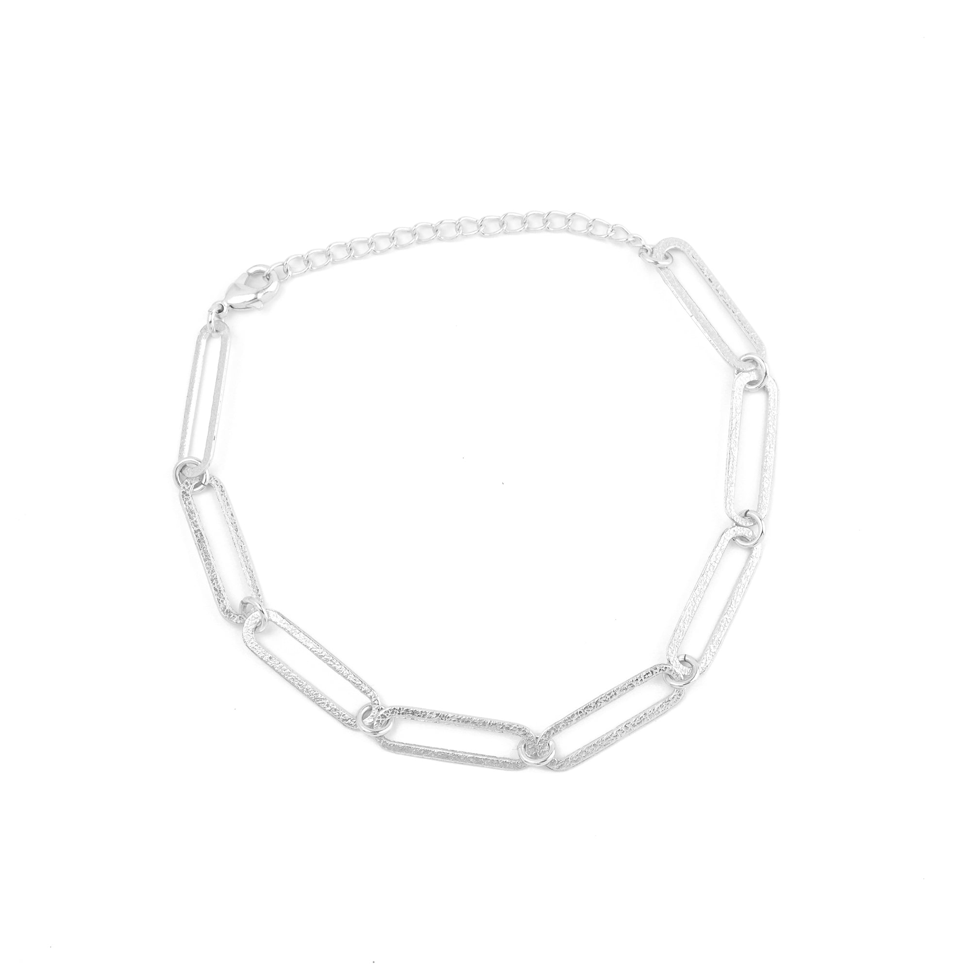 Silver chain necklace, open link silver necklace, minimalist silver jewellery, layering chain necklace, Susan Rose Jewellery, statement silver necklace, modern jewellery trends Australia, cool-toned fashion accessories, mixed metal styling, silver staple necklace